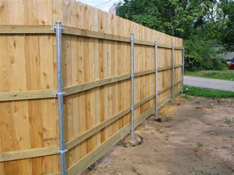 replace metal house post with wood|converting fence posts to wood.